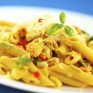 A closeup of a dish of Curry Pasta Chicken Salad