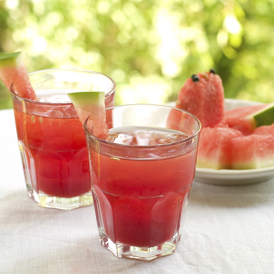 Two drink glasses are filled with Righteous Raspberry Watermelon Cooler.
