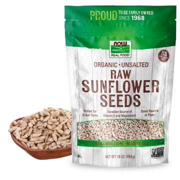 bag of Organic Unsalted Raw Sunflower Seeds with a bowl of Sunflower Seeds behind the bag