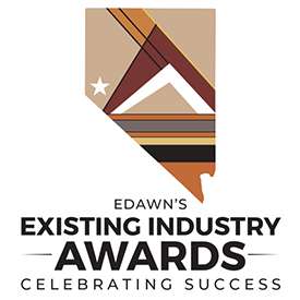 graphic illustration of the state of Nevada with horizontal stripes of brown and tan and triangular shapes representing mountains- text under edawn's existing industry awards celebrating success