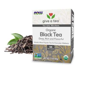 Box of NOW give a tea Organic Black Tea with tea leaves behind
