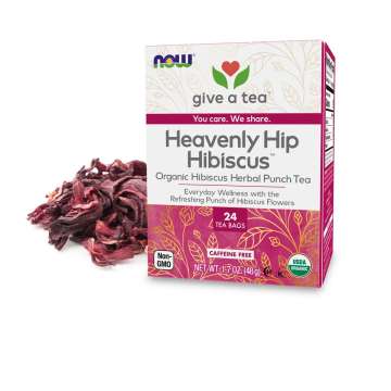 box of NOW Heavenly Hip hibiscus Tea with Hibiscus petals behind