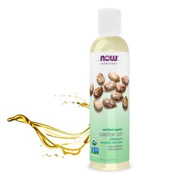 Bottle of NOW Solutions Castor Oil with a splash of oil behind 