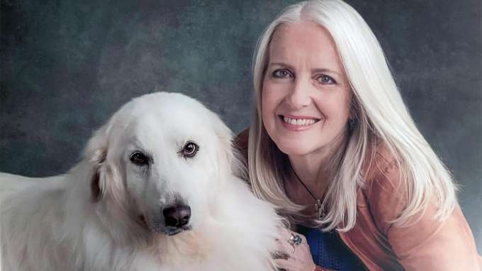 Dr. Royal with her white dog