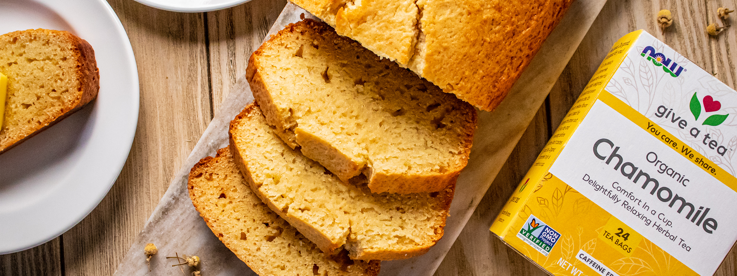 top view of Chamomile Vanilla Quick Bread next to a box of NOW Chamomile tea