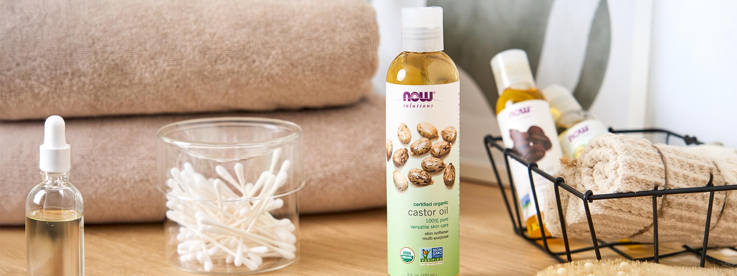 NOW Solutions Organic Castor Oil and dropper bottle of oil