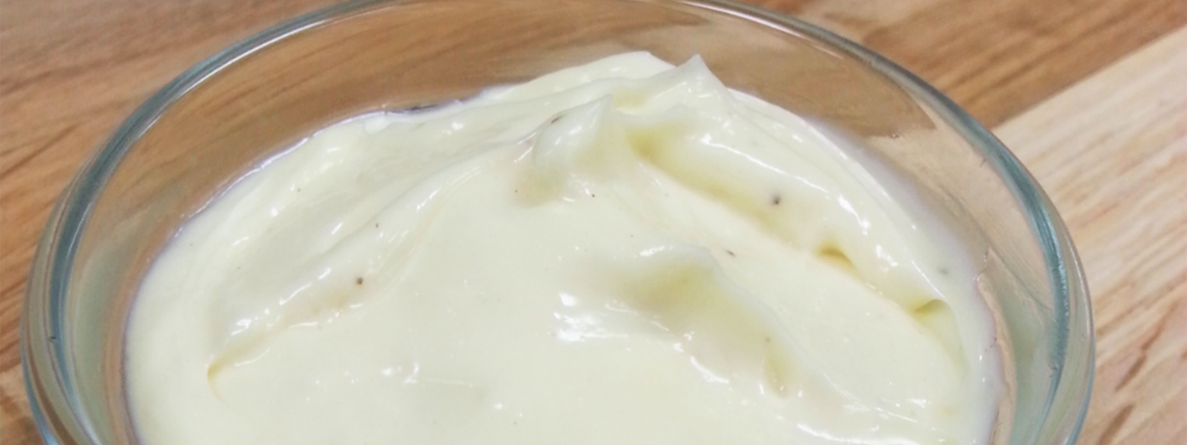 A closeup of a small dipping dish holding NOW Foods Mayonnaise