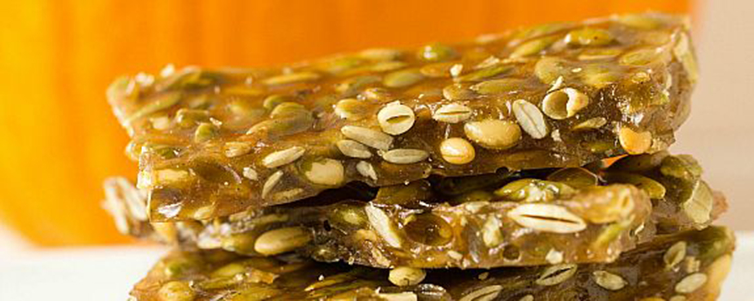 A closeup of a stack of Pumpkin Seed Brittle