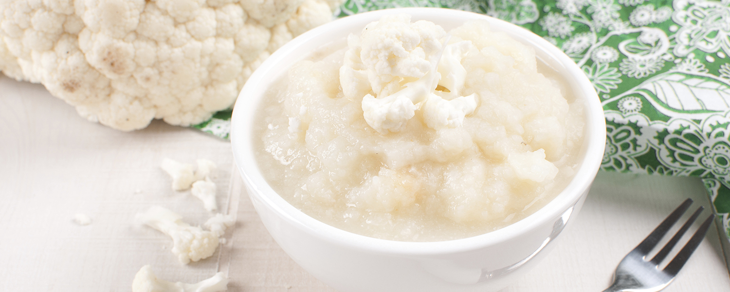 A small dipping dish holds a serving of Vegan Cauliflower Mash