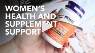 Women's health and supplement support text over a hand holding a bottle of NOW Women's Probiotic 20 Billion - 50 veg capsules.