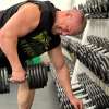 Matthew Mulligan in the gym lifting weights