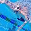 McKenzie Coan Swimming in pool