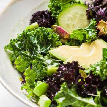 healthy salad, avocado, glass plate