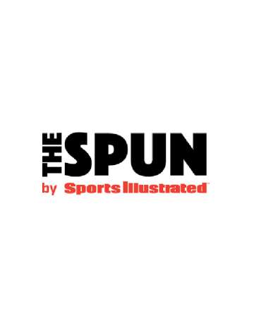 logo for THE SPUN - "the" is all caps and vertical in black non-serif font, "spun" is the same font and color but larger and horizontal, and underneath in capital and small red lettering is "by Sports Illustrated"