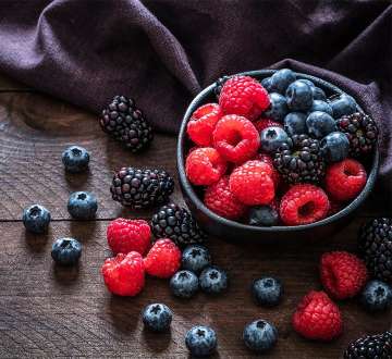 bowl of blueberries, blackberries, and raspberries.