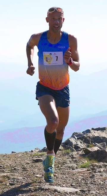 Joseph Gray running in a race