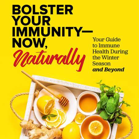 Bright yellow background with a wooden tray filled with tea, lemon slices, honey and ginger. Words written are Bolster Your Immunity Now Naturally, Your Guide to Immune Health During the Winter Season and Beyond.