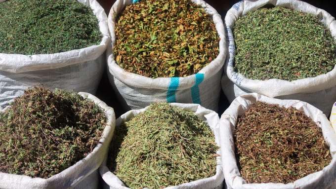 overhead shot of canvas bags containing various grains 