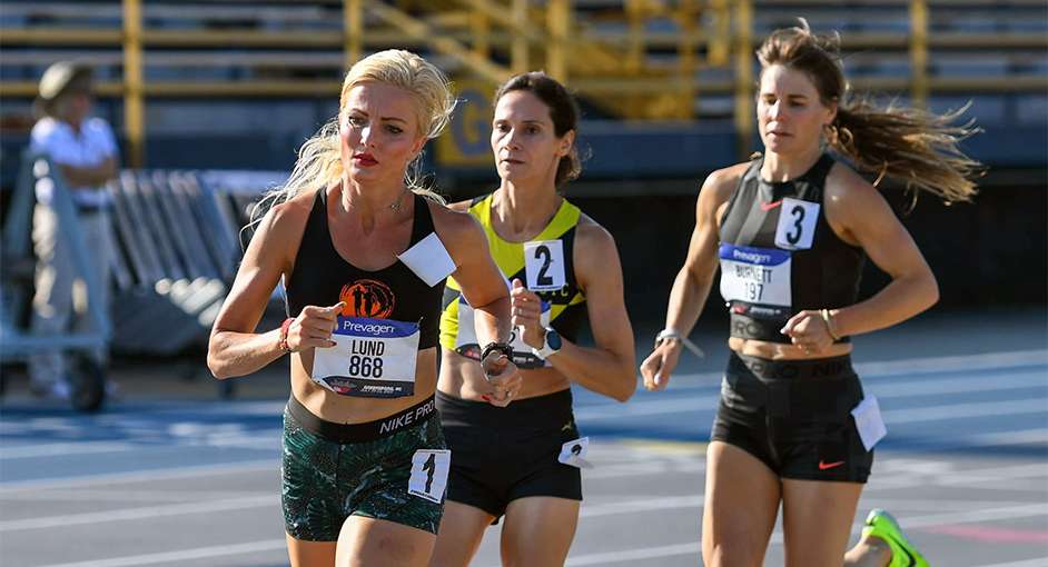 April Lund running in the lead of a race