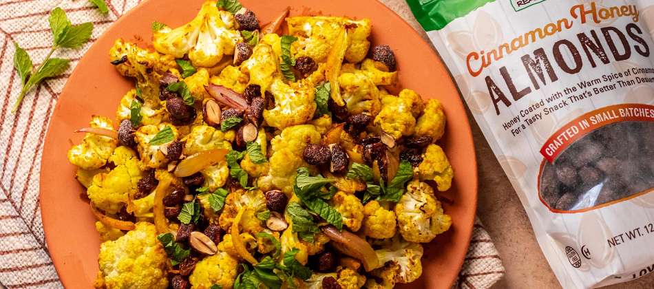 https://www.nowfoods.com/sites/default/files/styles/xxl_container_66/public/2024-01/Middle-Eastern-Roasted-Cauliflower-with-Cinnamon-Honey-Almonds-HP-Feature.jpg?itok=GFqmRtEh