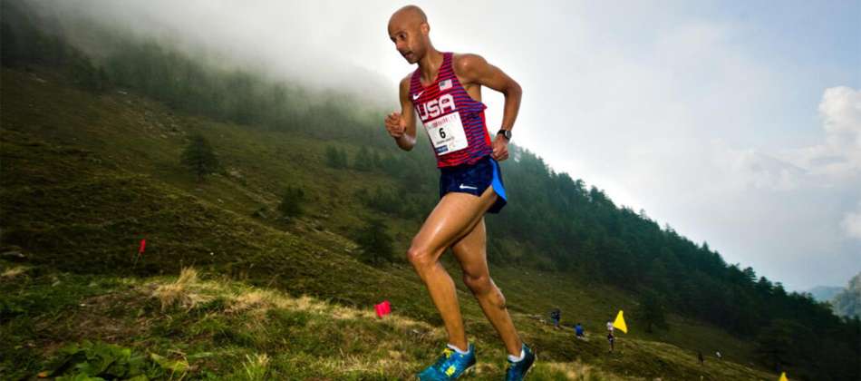 Joseph Gray running up a hill