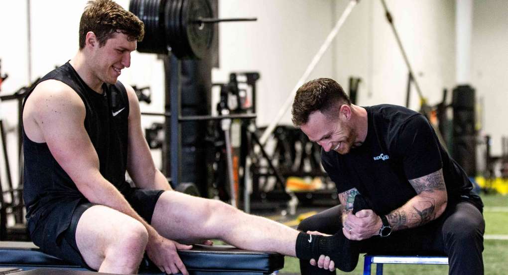 Patrick Coyne in Gym with Drew Sample 